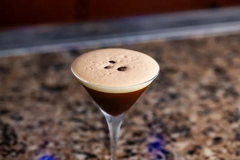 An espresso martini on the bar