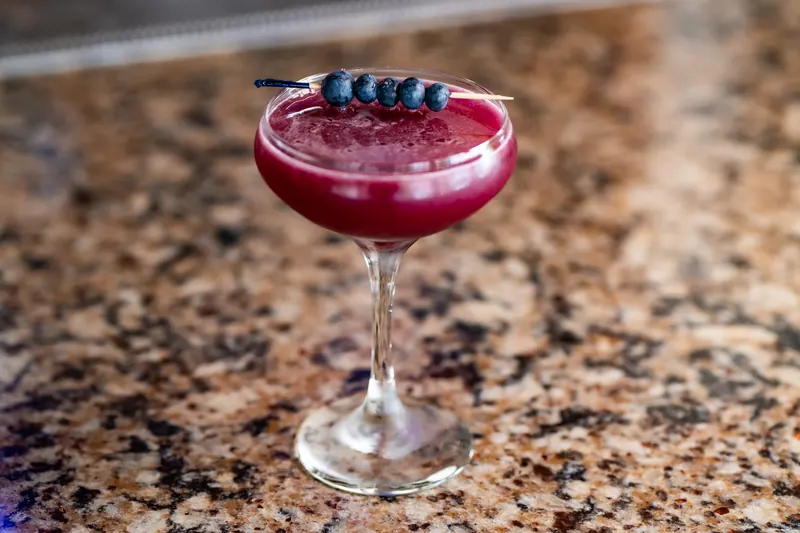 The Ocean Blue cocktail with blueberries