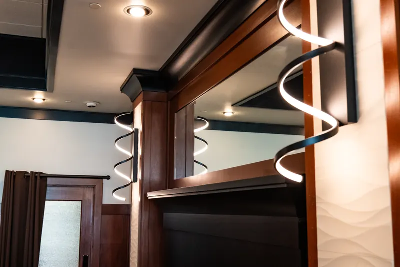 Wood paneling and sculpted lighting in the private dining room
