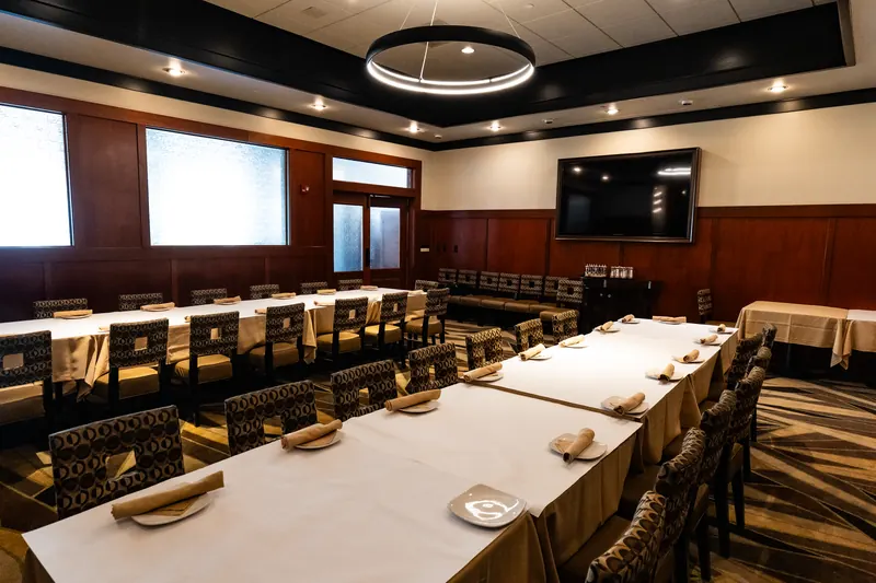 The private dining room with a screen for presentations